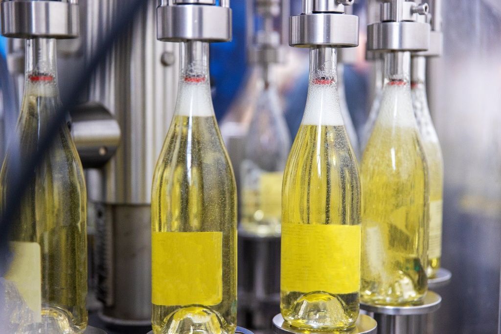 white-wine-bottle-production-at-winery-2023-11-27-05-26-38-utc.jpg